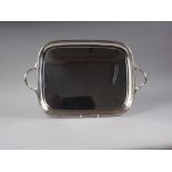 A rectangular silver two-handled tray, 69.4oz troy approx