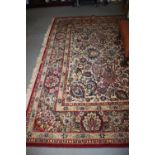 A Kashan super wool pile carpet of traditional Persian design with all-over scrolls and animals on a