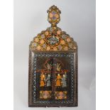 A Persian? painted wood wall mirror with folding doors, decorated figures, 24" high