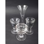 A 19th century drawn stem trumpet wine glass, on folded foot, two toastmaster's glasses, and a "