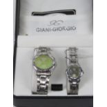 A 'His and Hers' stainless steel gents wristwatch and ladies wristwatch set, in presentation box.