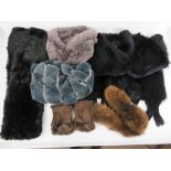 A quantity of faux fur shawls and scarves,