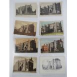 A quantity of vintage postcards and photo cards of the Abbey Gateway, twenty-four in total.