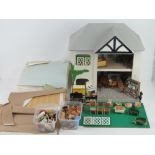 A hand built doll's house together with a large quantity of furniture and accessories inc metal