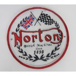 A contemporary cast metal Norton sign.