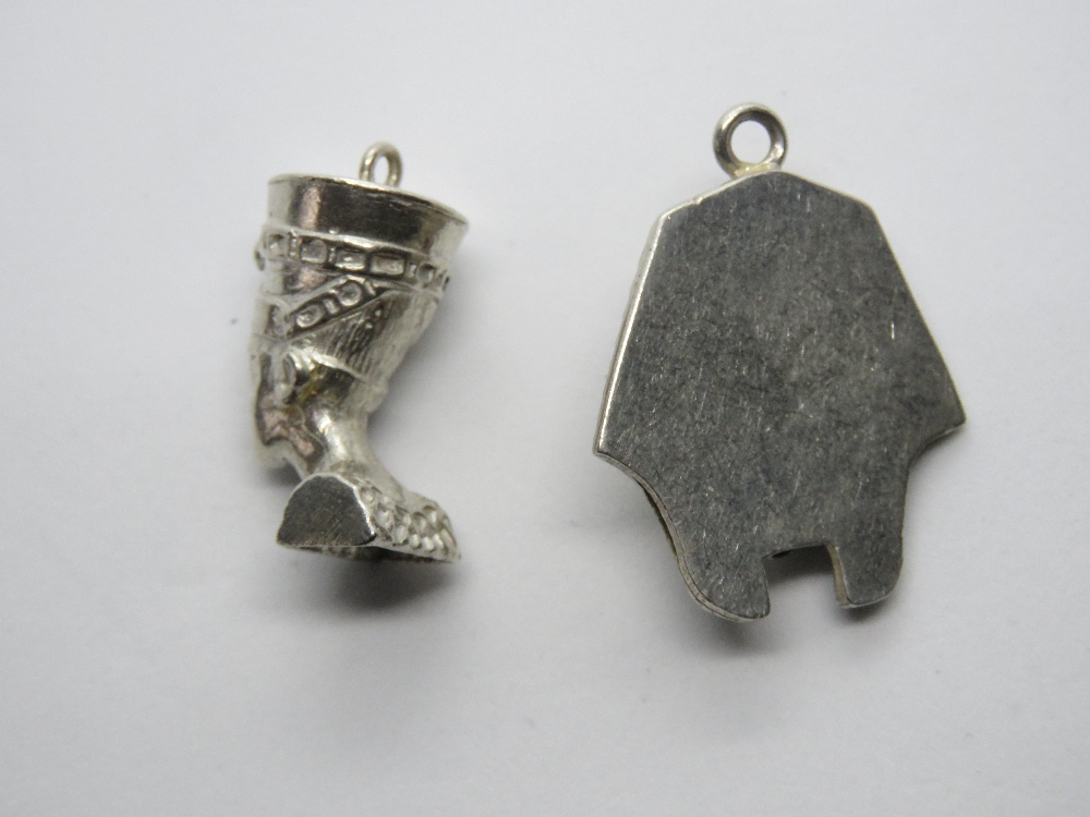 A silver charm in the form of Nefertiti Egyptian Queen and another white metal charm or pendant in - Image 2 of 3