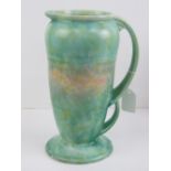 A Delcroft ware stylised double handled and mottled jug bearing backstamp 554, 27cm high.