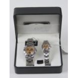 A 'His and Hers' stainless steel gents wristwatch and ladies wristwatch set, in presentation box.