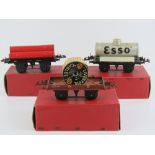 A Hornby 0 gauge gas cylinder wagon together with a flat truck with cable drum and a number one