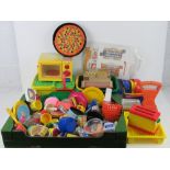 An extensive collection of shop or playhouse plastic food together with shopping baskets,