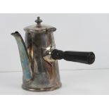 A silver plated hot chocolate pot having ebonised wooden side handle, standing 17.5cm high.