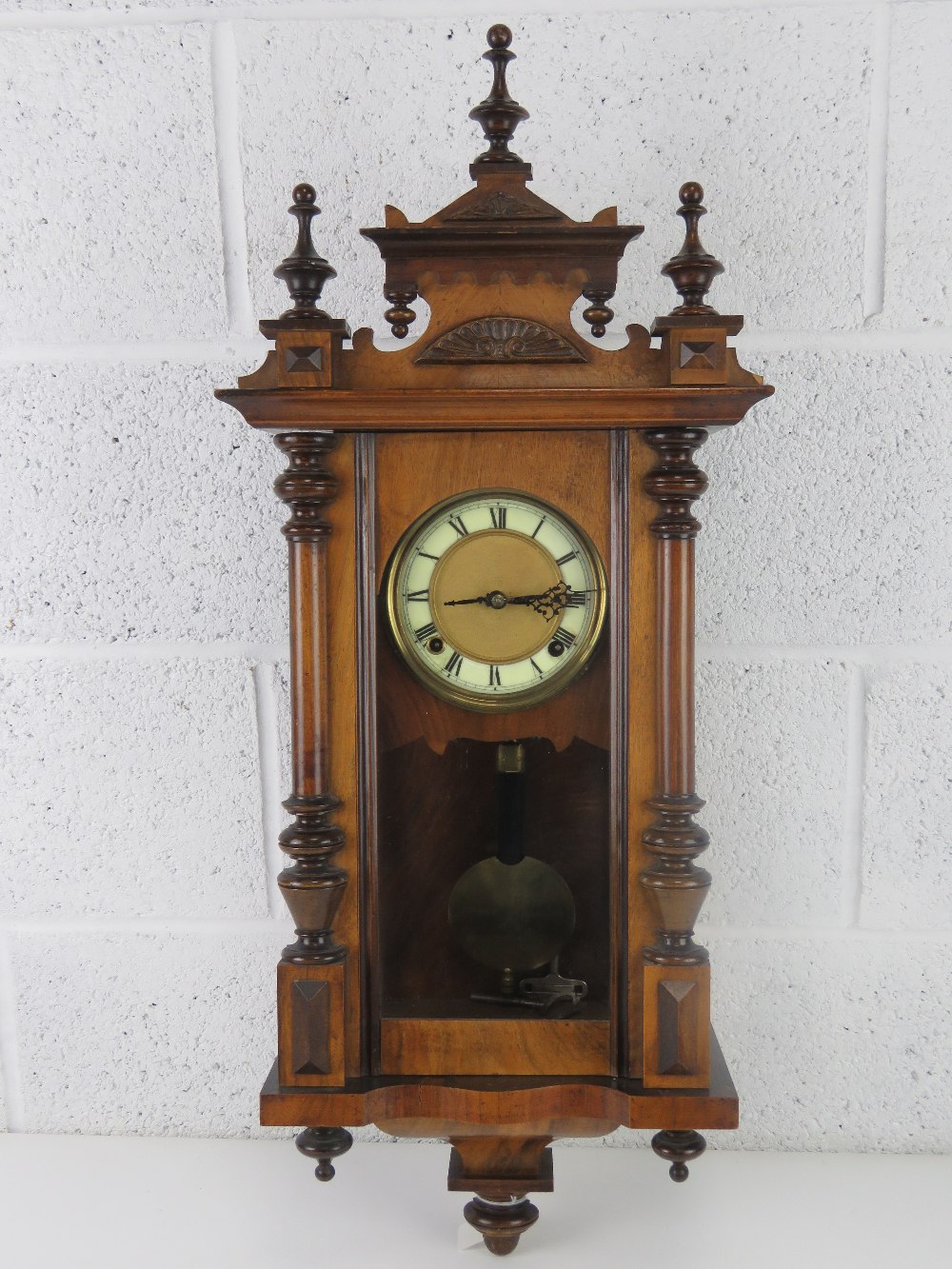 An early 20th century pine and mahogany Viennese wall clock, 6" dial, enamel chapter ring,