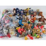 A quantity of assorted McDonald's soft toys inc Ty beanie babies, Wombles, Disney etc.