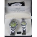 A 'His and Hers' stainless steel gents wristwatch and ladies wristwatch set, in presentation box.