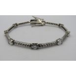 A HM silver bracelet set with white stones, hallmarked 925.