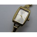 A guess wristwatch with silvered dial, adjustable length strap.