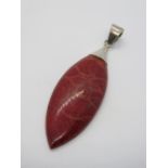 A 925 silver and red stone pendant, 6cm in length.