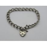 A silver charm bracelet having hallmarked heart padlock clasp.