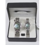 A 'His and Hers' stainless steel gents wristwatch and ladies wristwatch set, in presentation box.