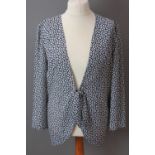 Frank Usher; a light floral jacket having tie waist in navy and white, UK size 12.