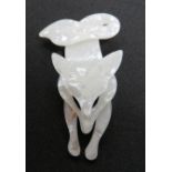 An overlaid plastic brooch in the style of Lea Stein in the form of a fox, 7.5cm in length.