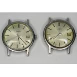 Two vintage Omega watch heads, stainless steel, a/f.