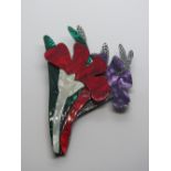 An overlaid plastic brooch in the style of Lea Stein in the form of a floral bouquet,