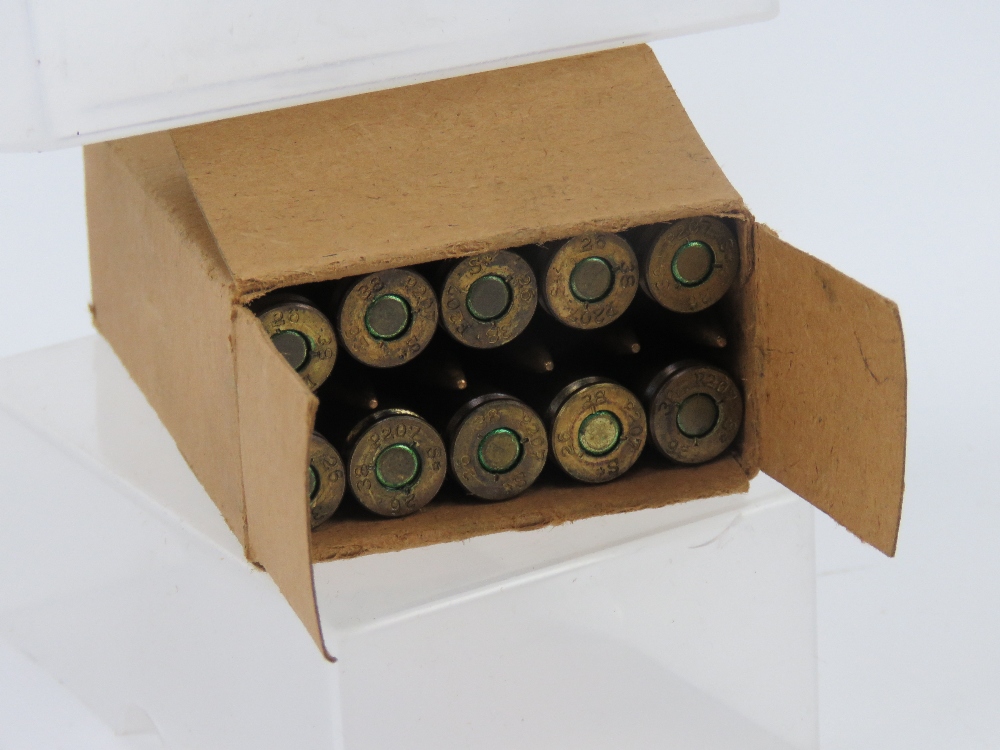 A quantity of inert WWII German unstruck 7.92 rounds in box which matches the rounds inside.