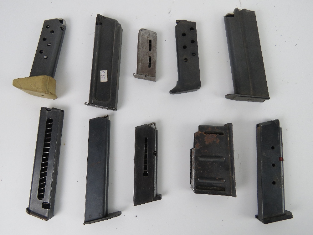 Ten assorted pistol magazines, one being for a Colt.22LR, one being Mauser, one being 7.65M/M.