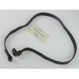 A WWII German MP40 black leather sling, made by Linden & Funke KG Iserlohn.