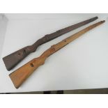 Two WWII K98 wooden stocks, a/f.
