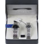 A 'His and Hers' stainless steel gents w