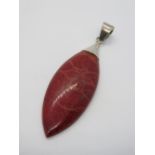 A 925 silver and red stone pendant, 6cm