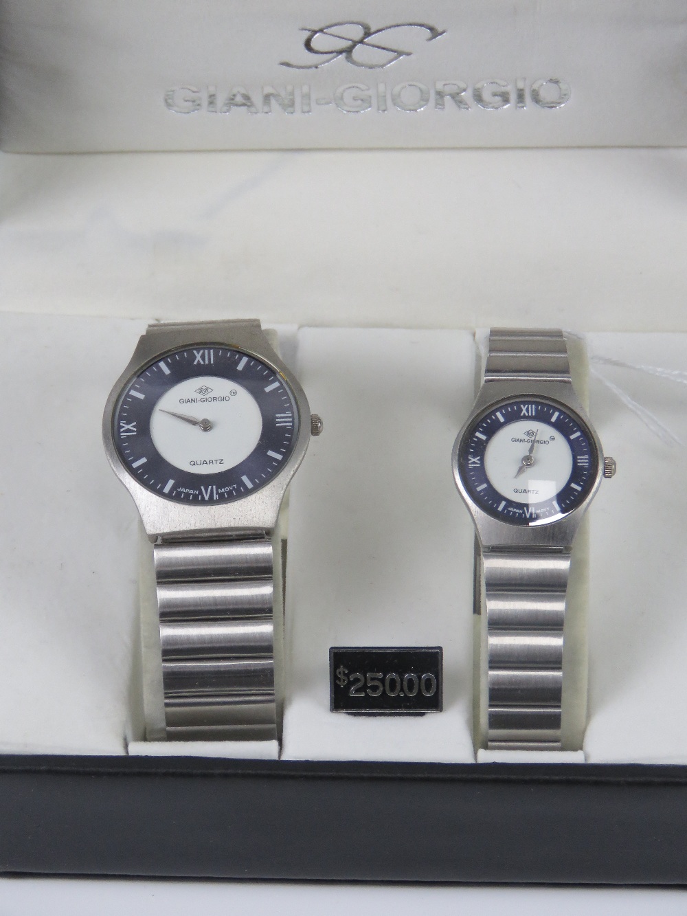 A 'His and Hers' stainless steel gents w