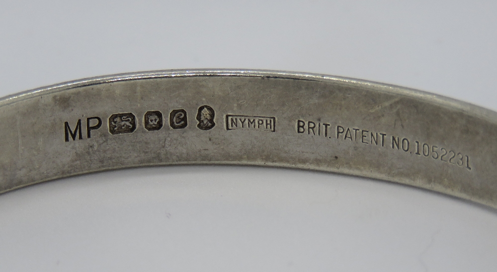 A HM silver bangle having overlapping ov - Image 2 of 2