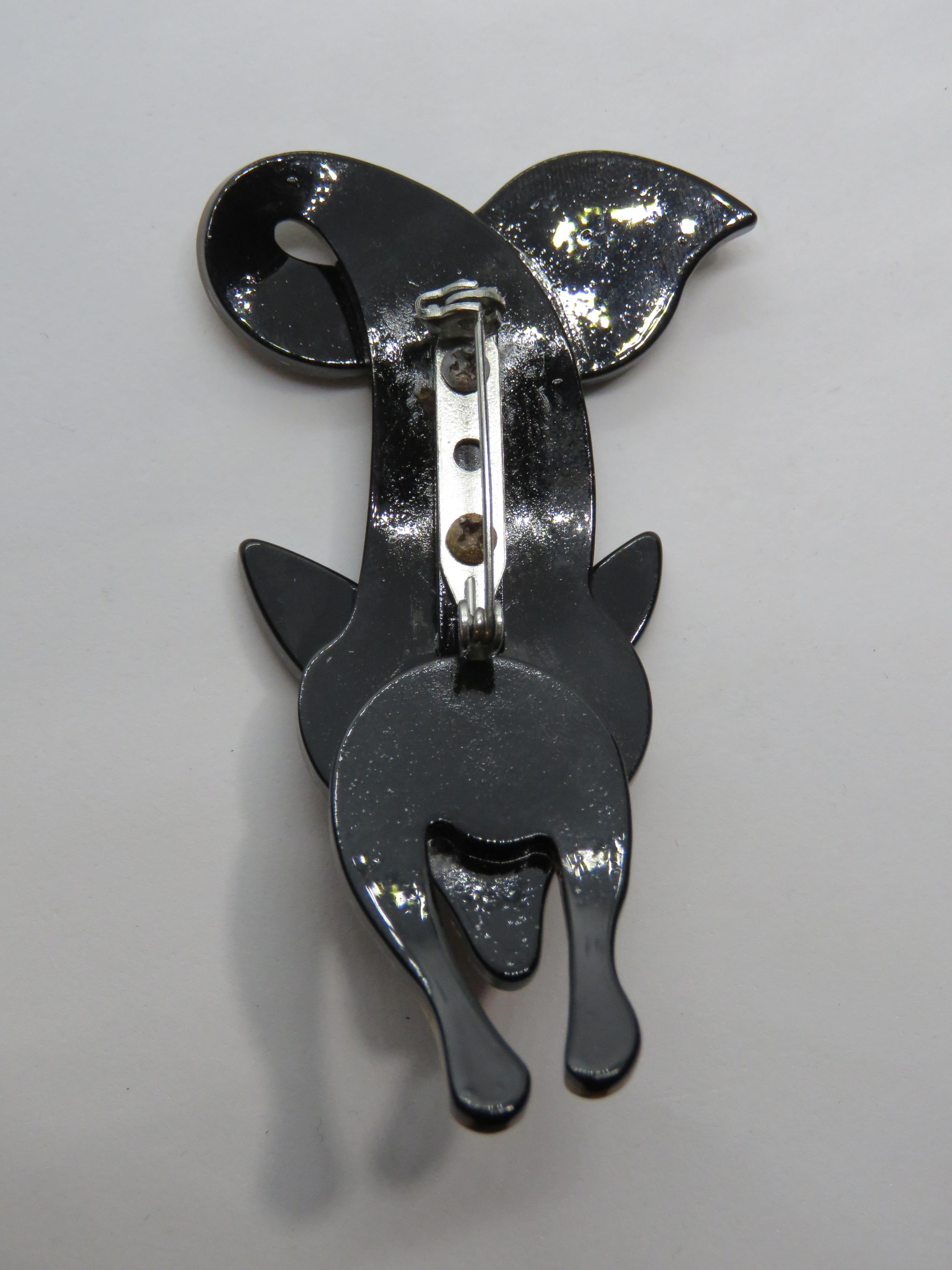 An overlaid plastic brooch in the style of Lea Stein in the form of a fox, 7cm in length. - Image 2 of 2