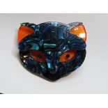 An overlaid plastic brooch in the style of Lea Stein in the form of a cats face, 5.5cm wide.