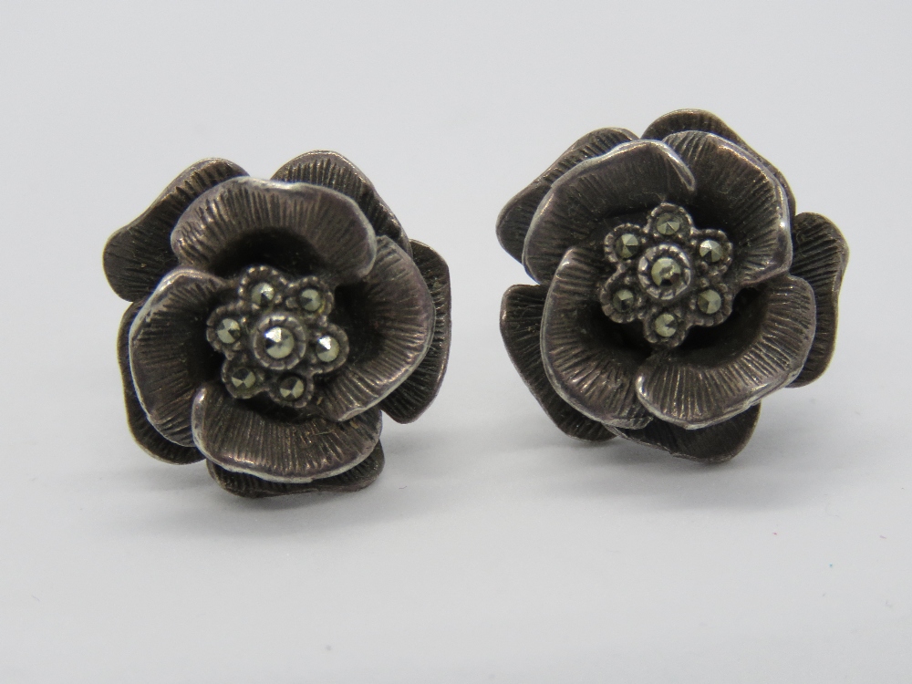 A pair of silver and marcasite floral st