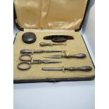 HM silver handled manicure items including scissors,