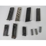 Ten assorted pistol magazines, one marke