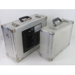 Two ex military flight cases measuring a