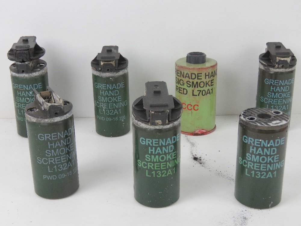 Seven inert British smoke grenades.