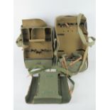 Three military canvas bags with leather