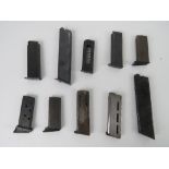 Ten assorted pistol magazines, one marke