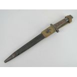 An Enfield Long Lee bayonet with leather scabbard and frog, British marked, serial number 9587.