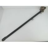 A WWI British Officer's sword with scabbard, dated 1913, marked N.C.B.