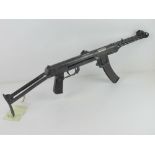 A PPS-43 SMG and accessories set including three magazines, oil bottle, magazine pouch,