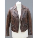 A brown leather biker style jacket by New Look size 10.