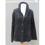 A David Emmanuel ladies black evening jacket, 9% wool, size 20.