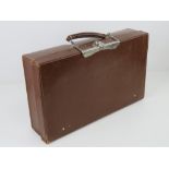 A vintage brown leather 'autosnap' briefcase 46 x 27 x 11cm.